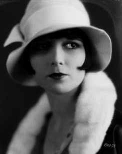 Actress Louise Brooks wearing a cloche hat